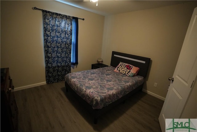 46 Persimmon Dr NE, Ludowici, GA 31316 - bedroom with wood finished floors and baseboards