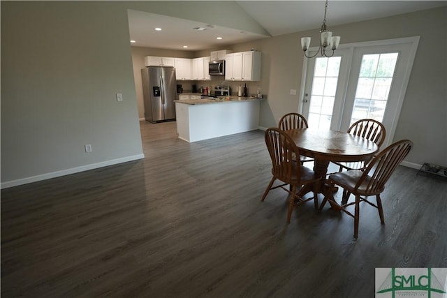 46 Persimmon Dr NE, Ludowici, GA 31316 - dining room featuring a chandelier, vaulted ceiling, dark wood-style flooring, baseboards, and recessed lighting