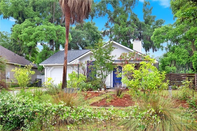 508 Pointe S Dr, Savannah, GA 31410 - view of front facade with a chimney and an attached garage