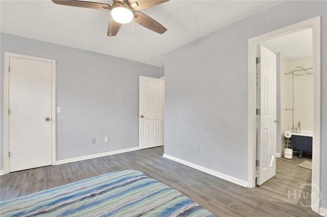 508 Pointe S Dr, Savannah, GA 31410 - bedroom with wood finished floors and a ceiling fan