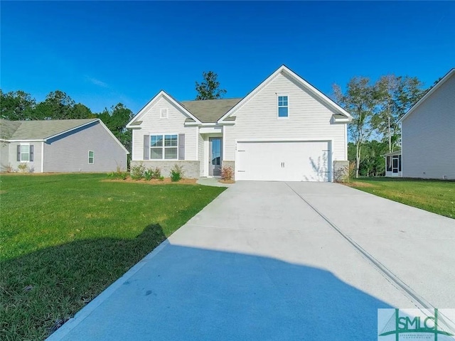 view of front of property featuring driveway, a front lawn, and a garage