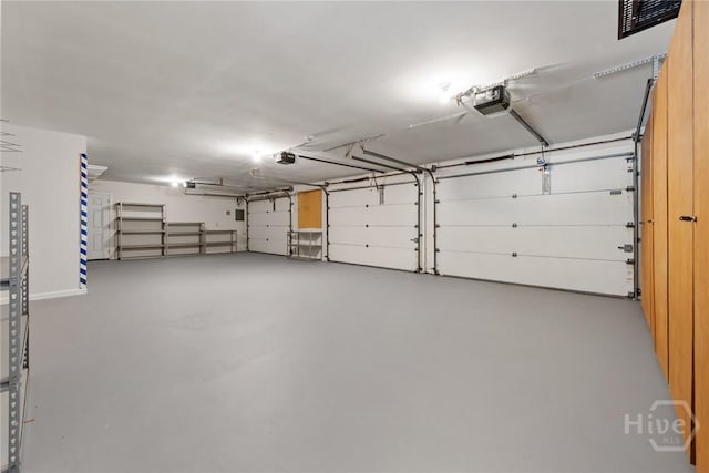 2402 Easy St, Savannah, GA 31406 - garage featuring a garage door opener