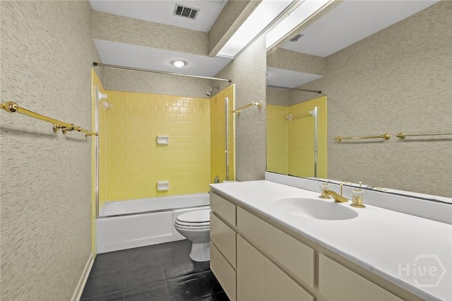 2402 Easy St, Savannah, GA 31406 - full bath featuring toilet, tile patterned flooring, shower / bathtub combination, vanity, and a textured wall