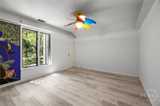 2402 Easy St, Savannah, GA 31406 - empty room with ceiling fan, light wood-type flooring, baseboards, and lofted ceiling