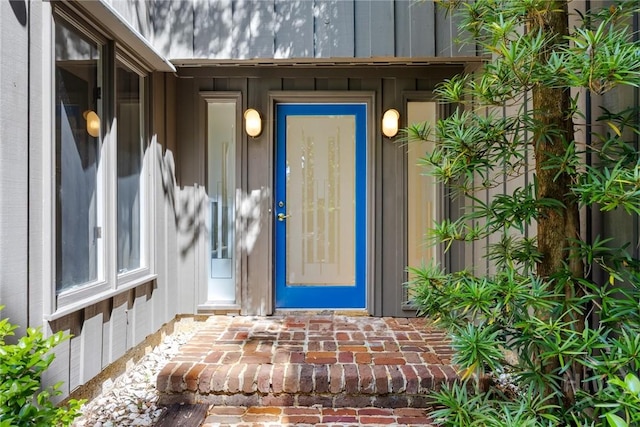 2402 Easy St, Savannah, GA 31406 - view of exterior entry featuring board and batten siding