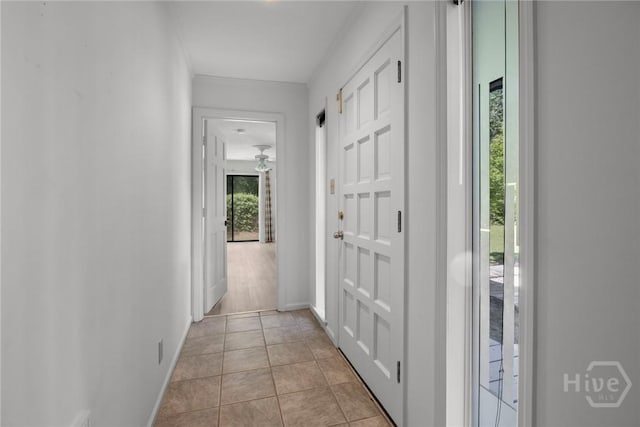 2402 Easy St, Savannah, GA 31406 - corridor with baseboards and light tile patterned floors