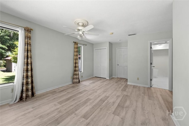 2402 Easy St, Savannah, GA 31406 - empty room featuring light wood-type flooring, ceiling fan, and baseboards