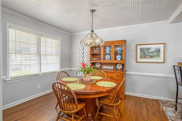 2014 Colonial Dr, Savannah, GA 31406 - dining room featuring wood finished floors, crown molding, and baseboards