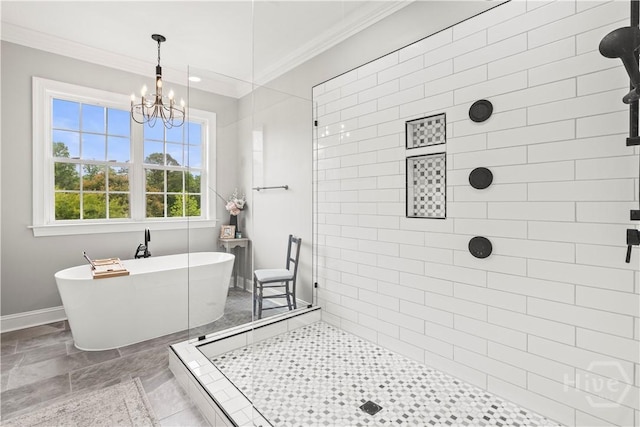 3309 Ga Highway 67, Pembroke, GA 31321 - full bath with crown molding, tiled shower, a freestanding bath, a chandelier, and baseboards