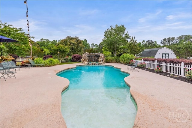 3309 Ga Highway 67, Pembroke, GA 31321 - view of swimming pool featuring fence, a patio, and view of scattered trees