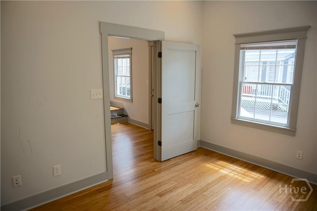 514-516 E Hall St, Savannah, GA 31401 - spare room with healthy amount of natural light, light wood-style flooring, and baseboards
