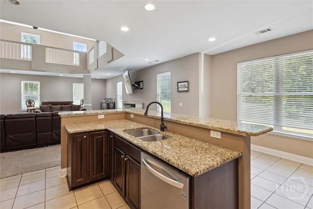 525 Elkins Cemetery Rd, Guyton, GA 31312 - kitchen with dishwasher, open floor plan, a sink, light tile patterned floors, and recessed lighting