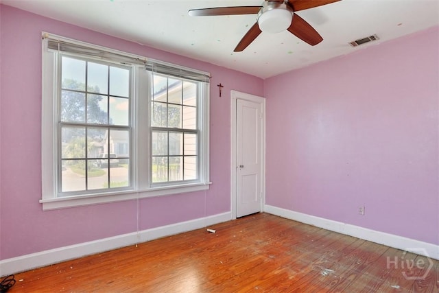 2120 E 39th St, Savannah, GA 31404 - spare room with baseboards, light wood-type flooring, and ceiling fan
