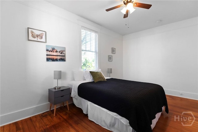 1216 E 31st St, Savannah, GA 31404 - bedroom featuring baseboards, wood finished floors, and a ceiling fan