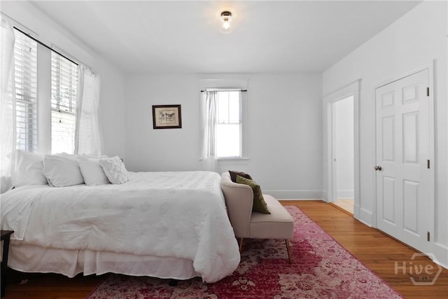 1216 E 31st St, Savannah, GA 31404 - bedroom with wood finished floors and baseboards
