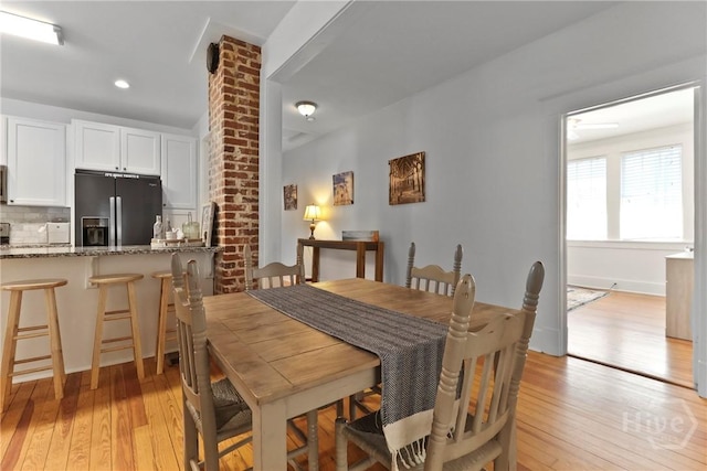 1216 E 31st St, Savannah, GA 31404 - dining room with light wood-type flooring and recessed lighting
