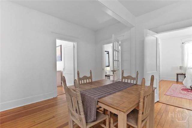 1216 E 31st St, Savannah, GA 31404 - dining room featuring light wood-style flooring and baseboards