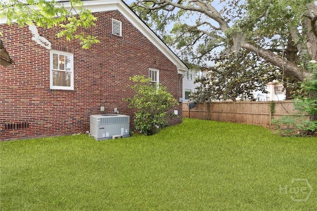 1216 E 31st St, Savannah, GA 31404 - view of home's exterior featuring cooling unit, crawl space, and brick siding