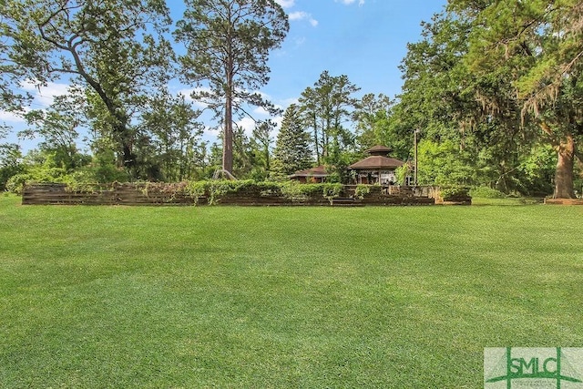 156 Lansing St, Brunswick, GA 31525 - view of grassy yard with a gazebo