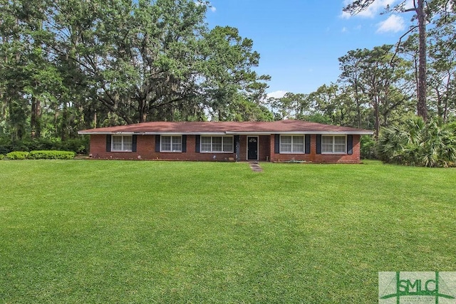 156 Lansing St, Brunswick, GA 31525 - ranch-style home featuring a front yard and brick siding