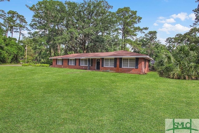 156 Lansing St, Brunswick, GA 31525 - single story home with a front lawn and brick siding