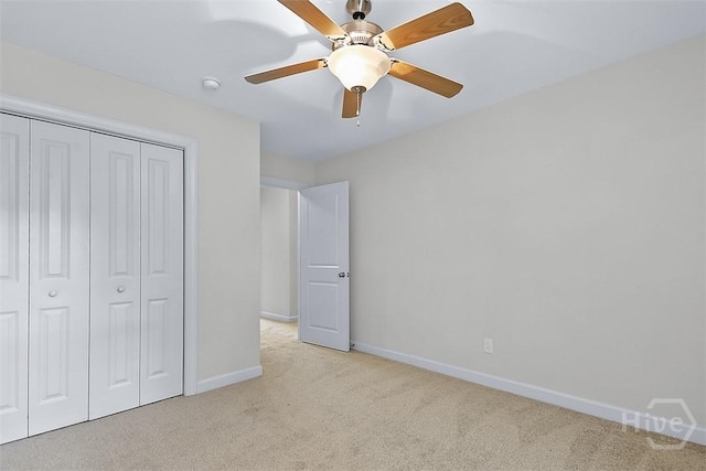 119 Sutton Ln, Pooler, GA 31322 - unfurnished bedroom featuring carpet, baseboards, a closet, and a ceiling fan