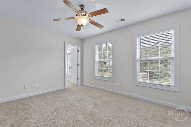 119 Sutton Ln, Pooler, GA 31322 - unfurnished room featuring baseboards, light carpet, and a ceiling fan