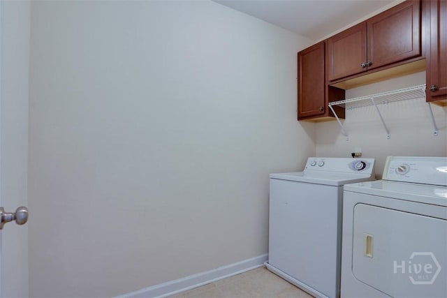 119 Sutton Ln, Pooler, GA 31322 - laundry area with cabinet space, washer and dryer, and baseboards
