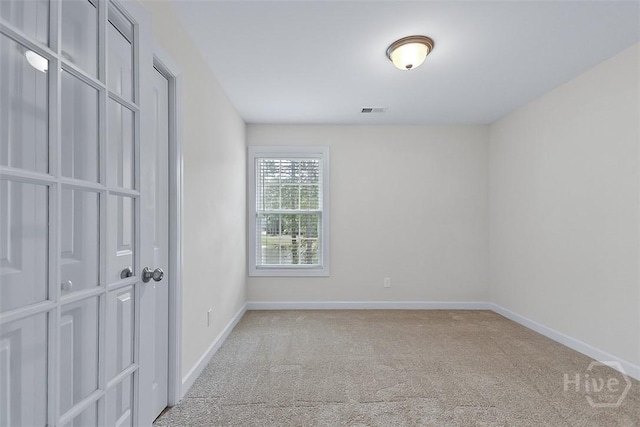119 Sutton Ln, Pooler, GA 31322 - unfurnished bedroom with light colored carpet and baseboards