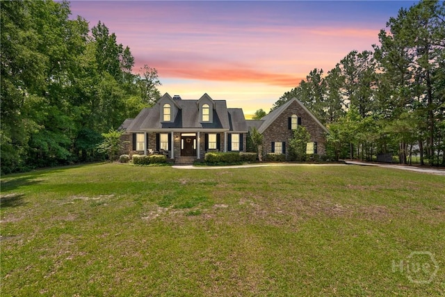 784 Ebenezer Rd, Rincon, GA 31326 - view of front of house featuring a porch and a yard