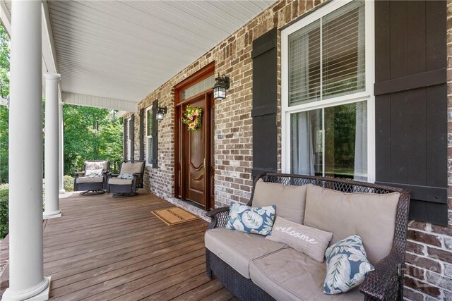 784 Ebenezer Rd, Rincon, GA 31326 - wooden terrace featuring covered porch and outdoor lounge area