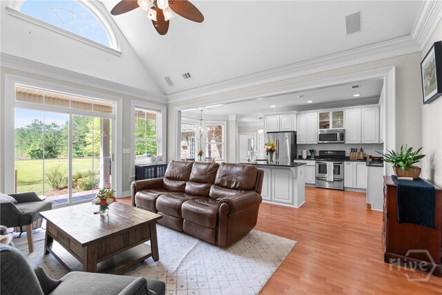 784 Ebenezer Rd, Rincon, GA 31326 - living area with light wood-style flooring, a ceiling fan, high vaulted ceiling, ornamental molding, and recessed lighting