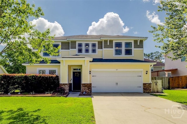 417 Keiffer Dr, Rincon, GA 31326 - view of front of home featuring an attached garage, driveway, and brick siding