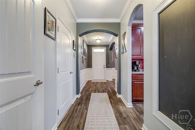 417 Keiffer Dr, Rincon, GA 31326 - hallway with arched walkways, dark wood-style flooring, crown molding, and a decorative wall