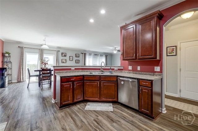 417 Keiffer Dr, Rincon, GA 31326 - kitchen featuring dishwasher, a sink, ornamental molding, a peninsula, and dark wood-type flooring