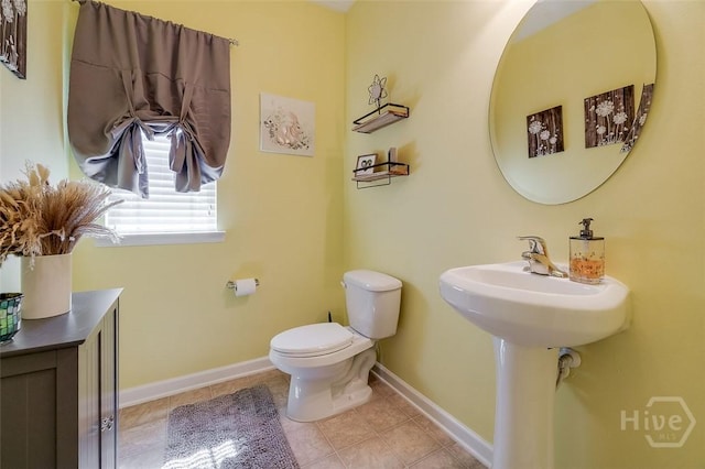 417 Keiffer Dr, Rincon, GA 31326 - bathroom with toilet, tile patterned floors, and baseboards