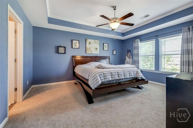 417 Keiffer Dr, Rincon, GA 31326 - carpeted bedroom with a tray ceiling, baseboards, and ceiling fan