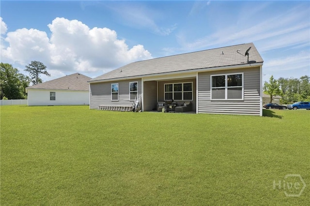 203 Merganser Dr, Pooler, GA 31322 - rear view of house featuring a lawn and roof with shingles
