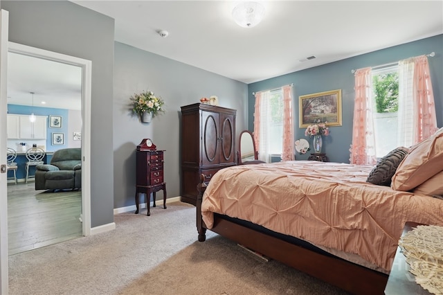 203 Merganser Dr, Pooler, GA 31322 - bedroom with multiple windows, carpet flooring, and baseboards