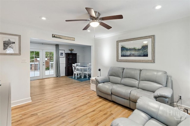 5633 Lafitte Dr, Savannah, GA 31406 - living room featuring light wood-style floors, ceiling fan, french doors, recessed lighting, and ornamental molding