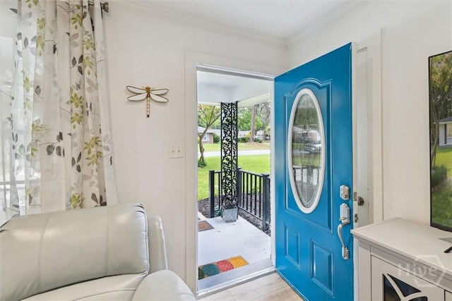 5633 Lafitte Dr, Savannah, GA 31406 - entrance foyer with ornamental molding and light wood-type flooring
