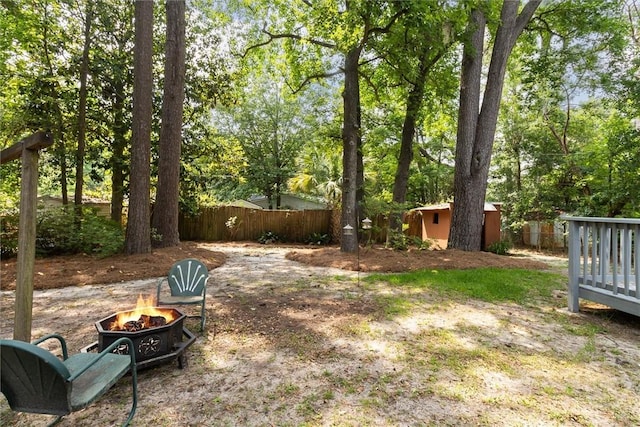 5633 Lafitte Dr, Savannah, GA 31406 - view of yard with an outdoor fire pit and an outdoor structure