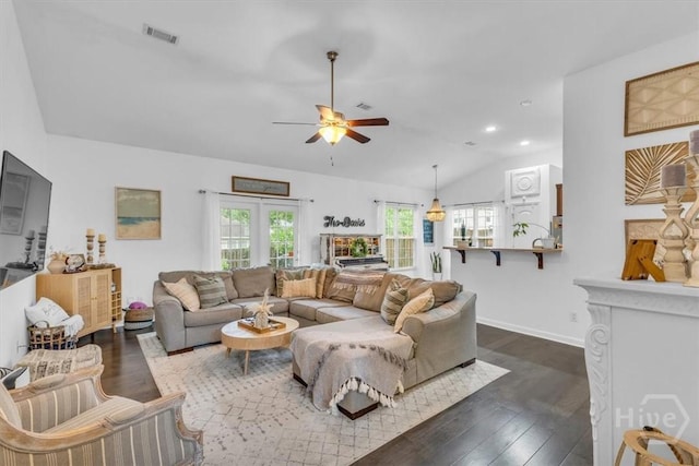 living room with vaulted ceiling, dark wood-type flooring, ceiling fan, baseboards, and recessed lighting