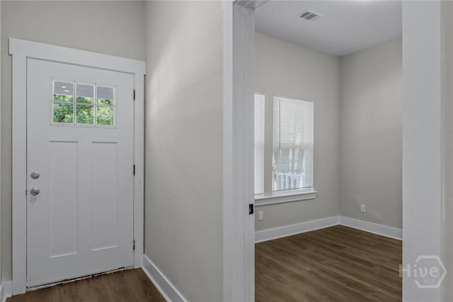 17 Nelson St, Savannah, GA 31415 - foyer entrance with dark wood-style floors and baseboards