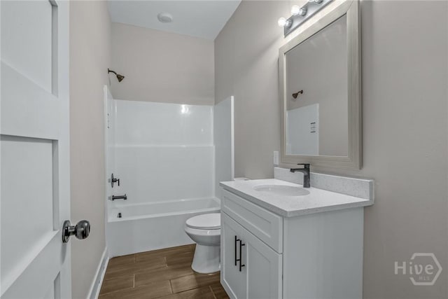 17 Nelson St, Savannah, GA 31415 - bathroom with vanity, toilet, wood finished floors, and tub / shower combination