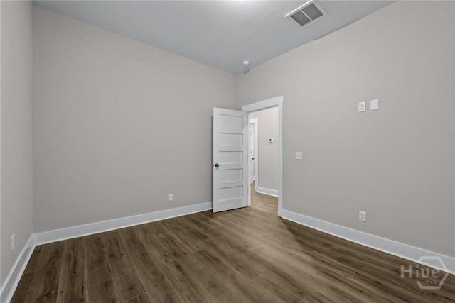 17 Nelson St, Savannah, GA 31415 - unfurnished room with dark wood-type flooring and baseboards