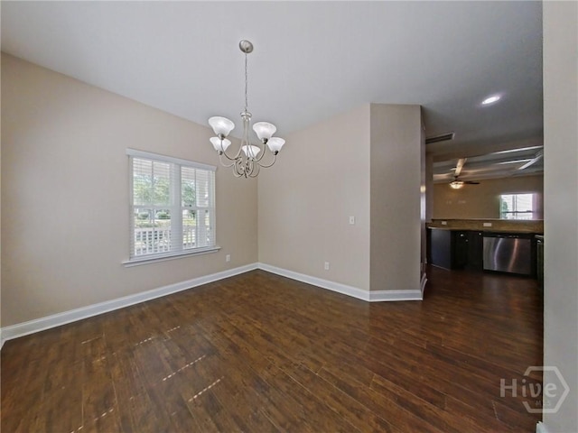 225 James Dunham Pkwy, Richmond Hill, GA 31324 - empty room with plenty of natural light, dark wood-style floors, baseboards, a chandelier, and recessed lighting