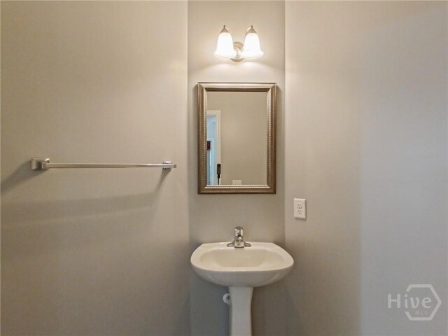225 James Dunham Pkwy, Richmond Hill, GA 31324 - bathroom featuring a sink