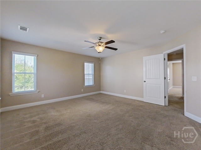 225 James Dunham Pkwy, Richmond Hill, GA 31324 - carpeted spare room with a ceiling fan and baseboards