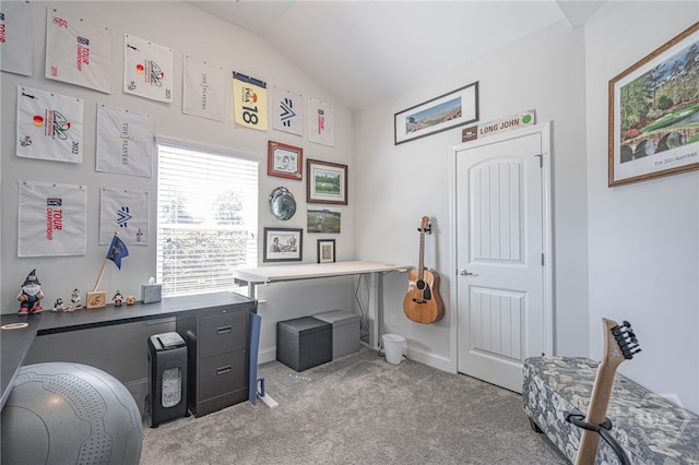 home office with carpet flooring, lofted ceiling, and baseboards